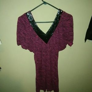 Black and pink zebra print shirt.